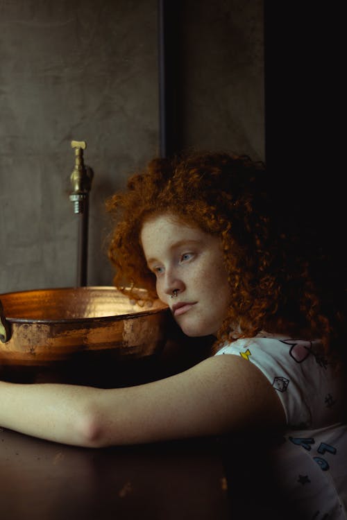 Woman Carrying Basin