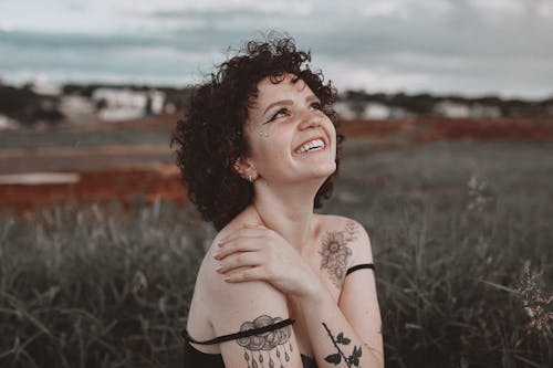 Free Woman Holding Her Shoulder Stock Photo