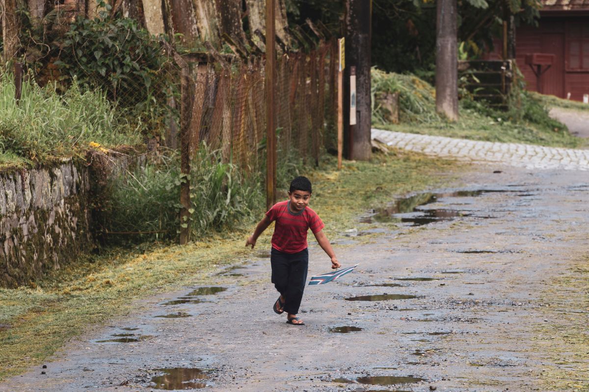 Child enjoying outdoor travel activities with asthma well-managed