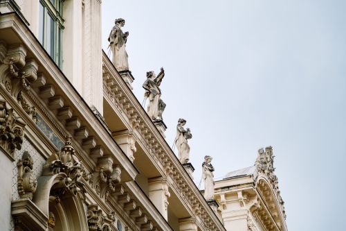 Free Low angle view of ornate statues and architecture on the Opera Garnier in Paris, France. Stock Photo