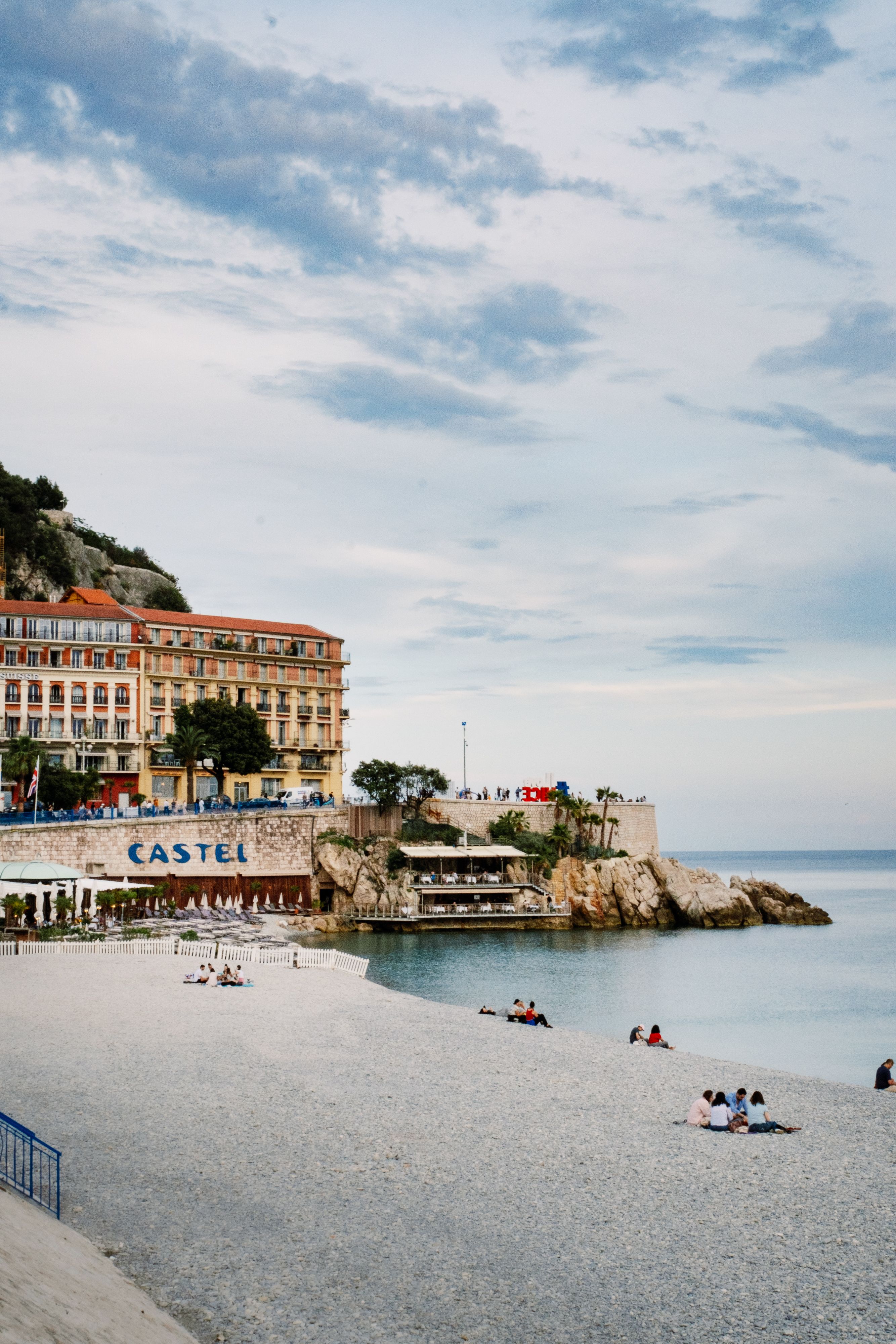 Beautiful beach and historic buildings in Nice, France, perfect for travel and leisure.