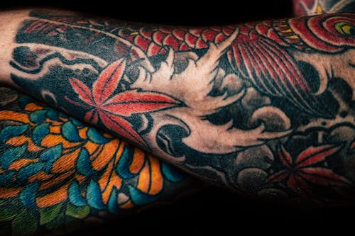 Foto De Close Up De Pessoa Com Tatuagens