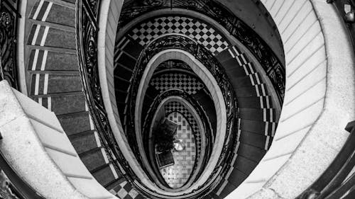 Monochrome Photo of Spiral Staircase