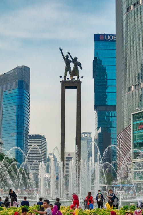 Free Photo of People Standing Near Water Fountain Stock Photo