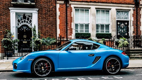 Blue Coupe on Road