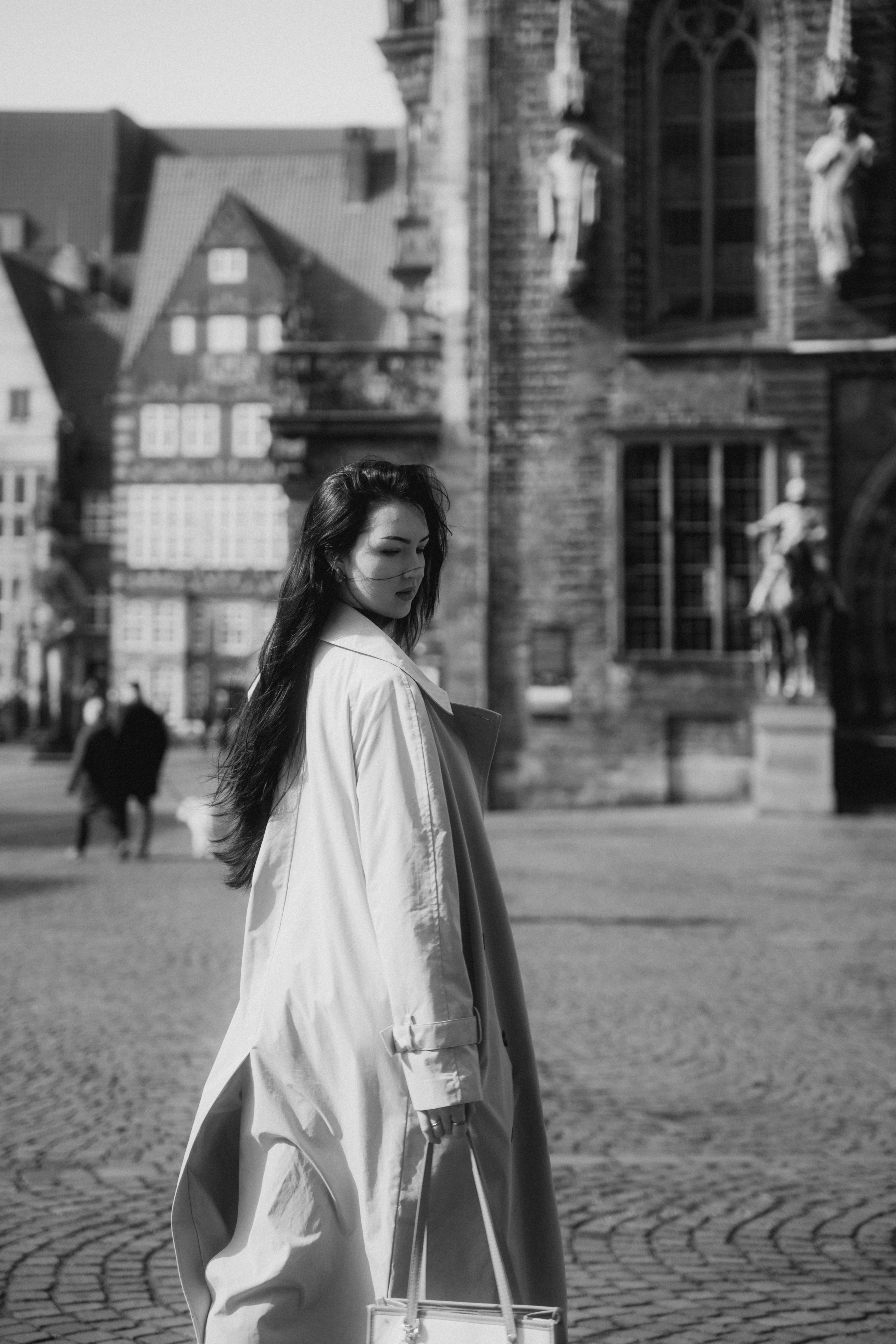 Black and White Photo of a Woman in a Trench Walking in a City · Free ...