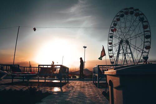 Free Silhouette of Standing Man in Recreational Park Stock Photo