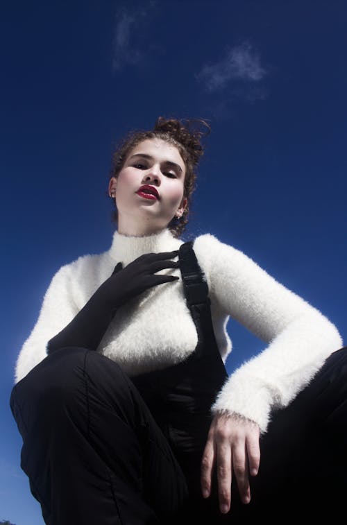Model in a White Shaggy Sweater and Black Ski Pants