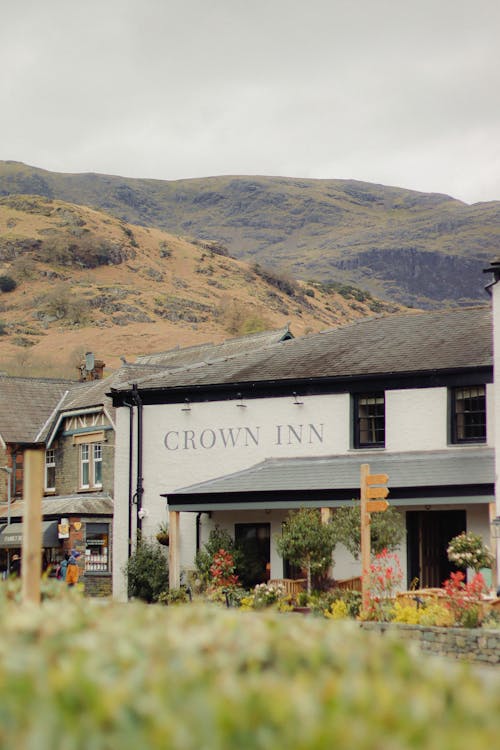 A picture of a building with a sign that says crow inn