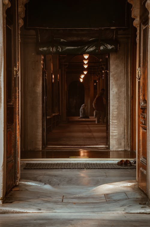 Woman Kneeling Inside Room