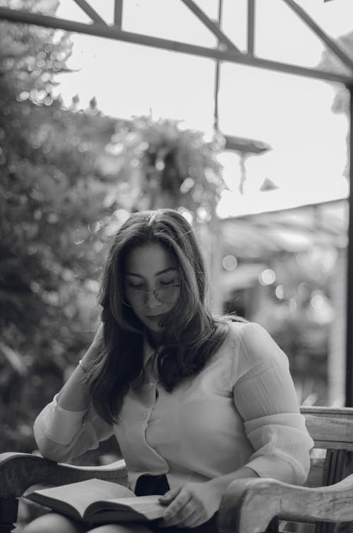 Woman Sitting with Book