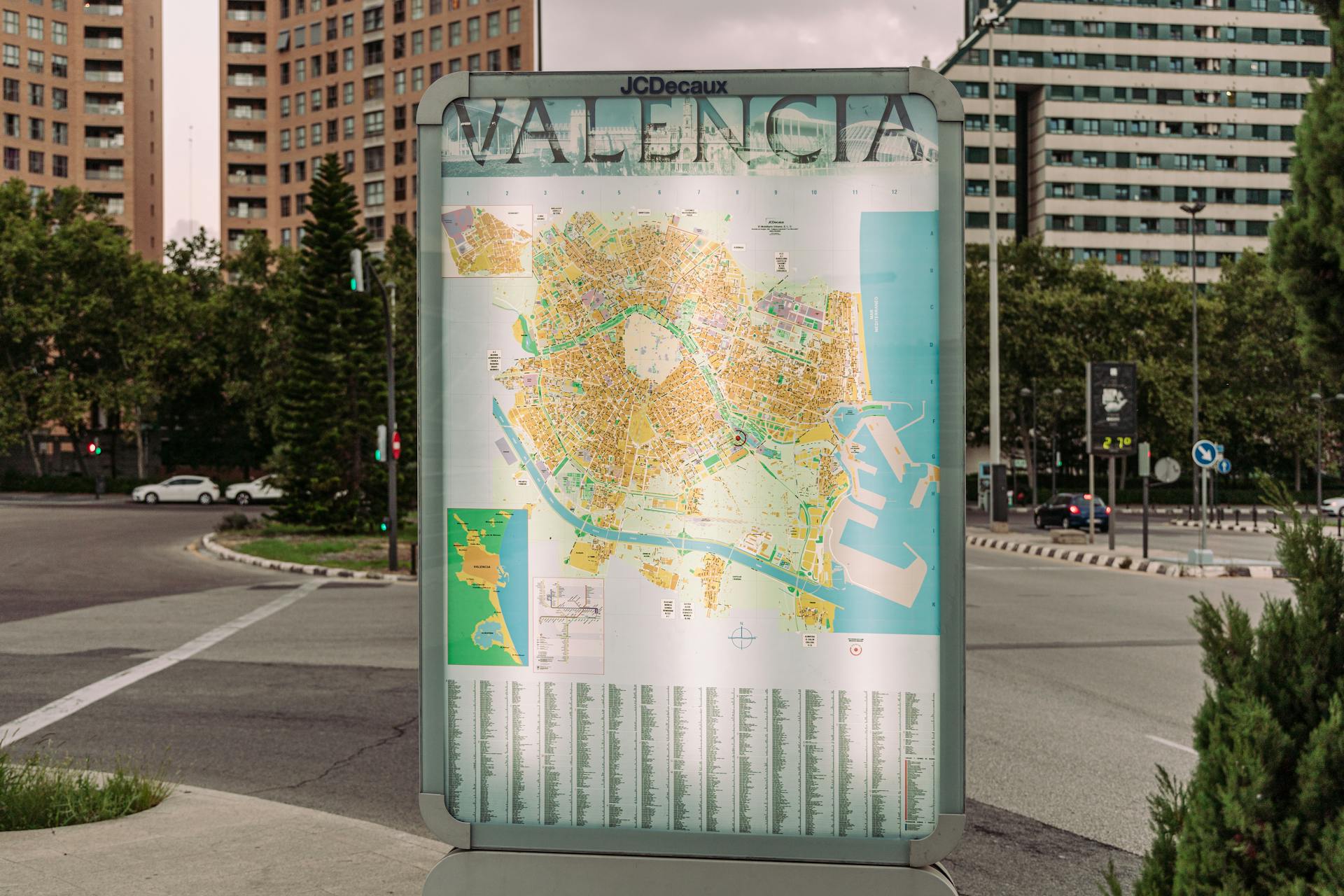 Street map display in Valencia city with urban background.