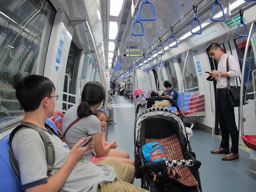 Free stock photo of passengers in train