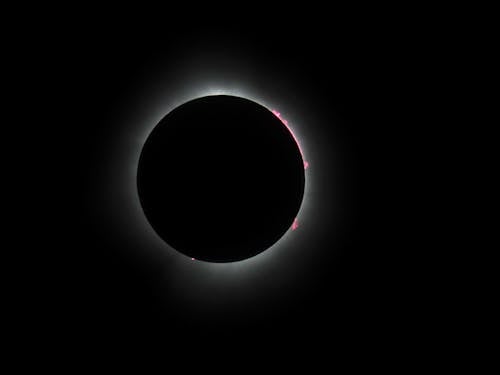 Free A solar eclipse is seen in the sky Stock Photo