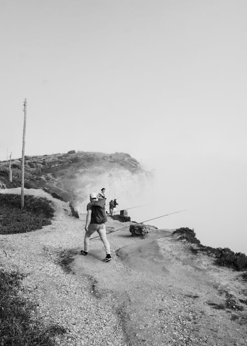 Balık tutmak, balıkçı, çubuklar içeren Ücretsiz stok fotoğraf