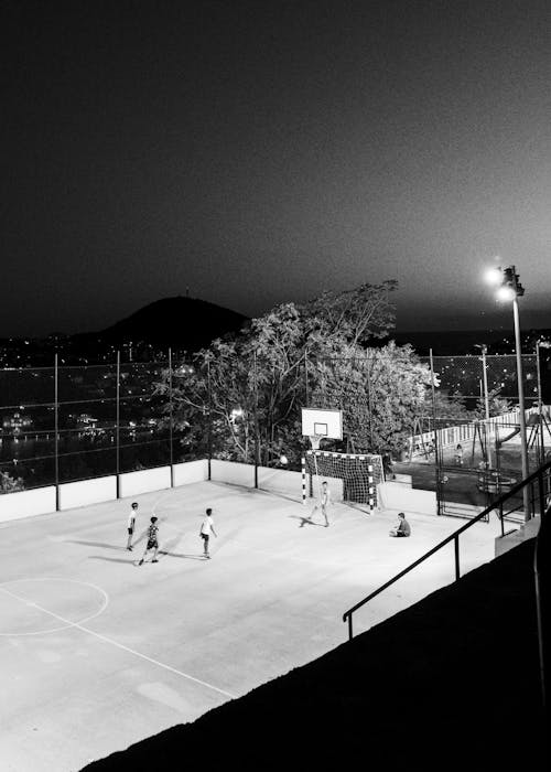 A black and white photo of a basketball court