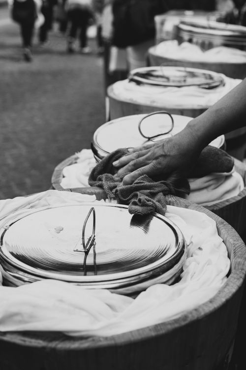 Free Black and white image of hands working on pottery at a Cholula market. Stock Photo