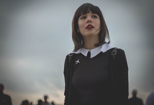 Woman Wearing Black Long Sleeve Shirt 