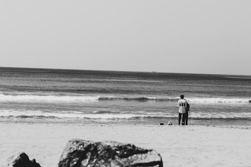 couple at beach in black and white 