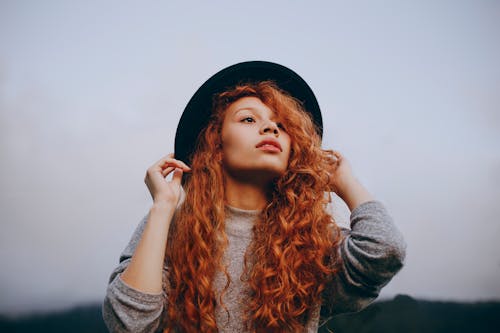 Free Red-haired Woman Wearing Black Round Hat Stock Photo