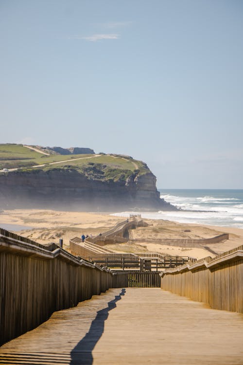 Foto profissional grátis de beach, calçadão, cenário