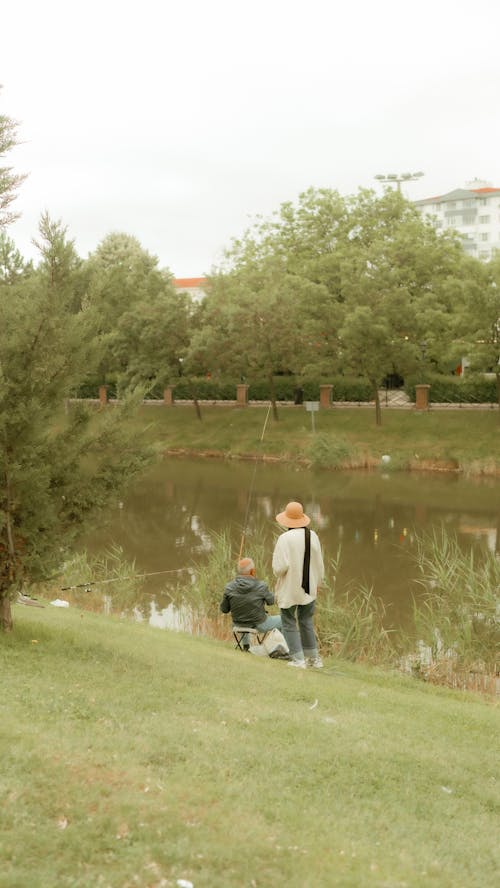 Balık tutmak, çift, dikey atış içeren Ücretsiz stok fotoğraf