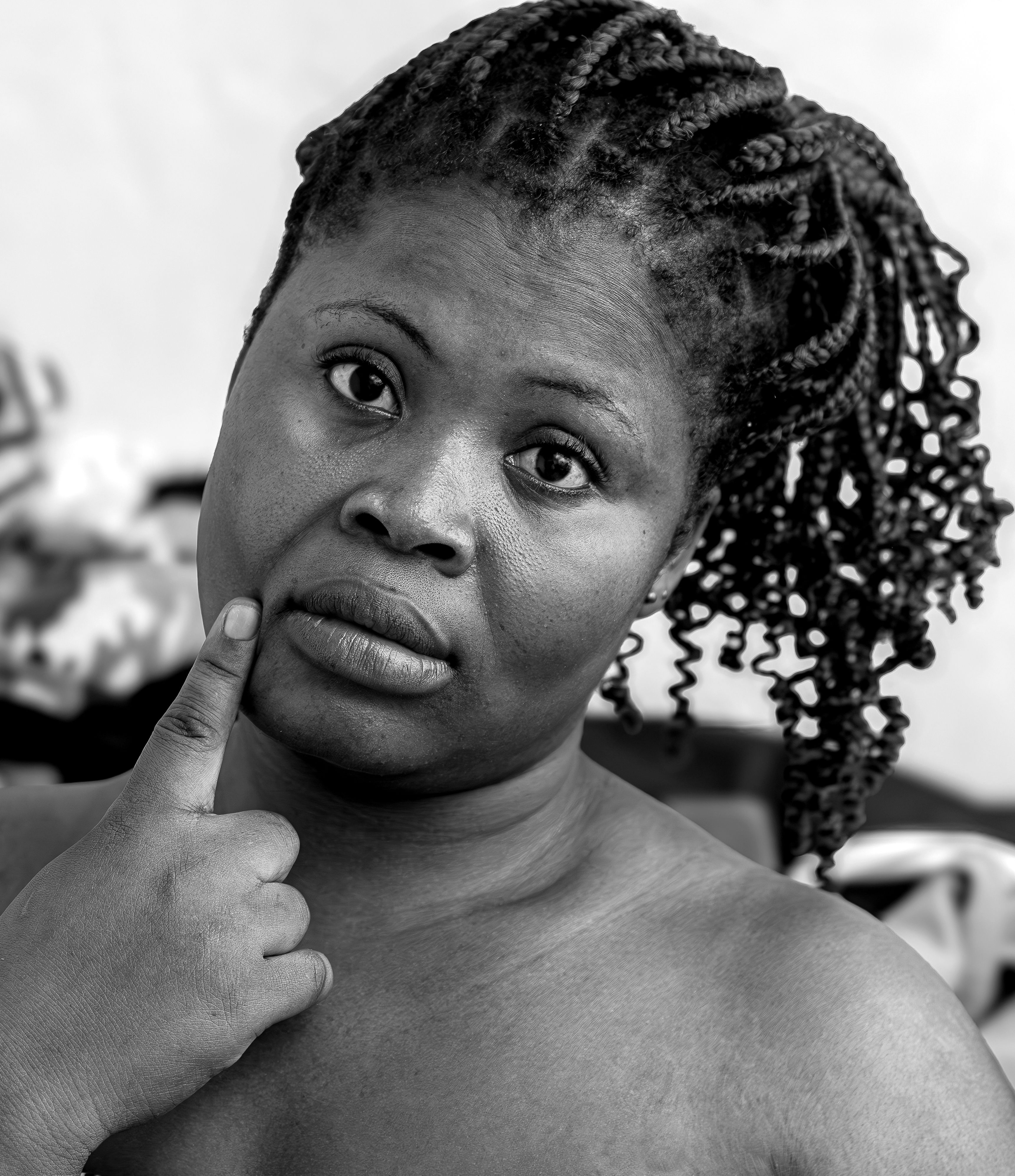 Portrait of a Woman with Braided Hair · Free Stock Photo