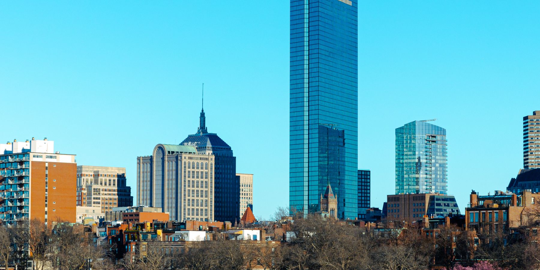 Stunning view of Boston's skyline featuring the iconic John Hancock Tower and modern architecture.