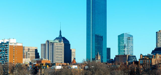 Stunning view of Boston's skyline featuring the iconic John Hancock Tower and modern architecture.