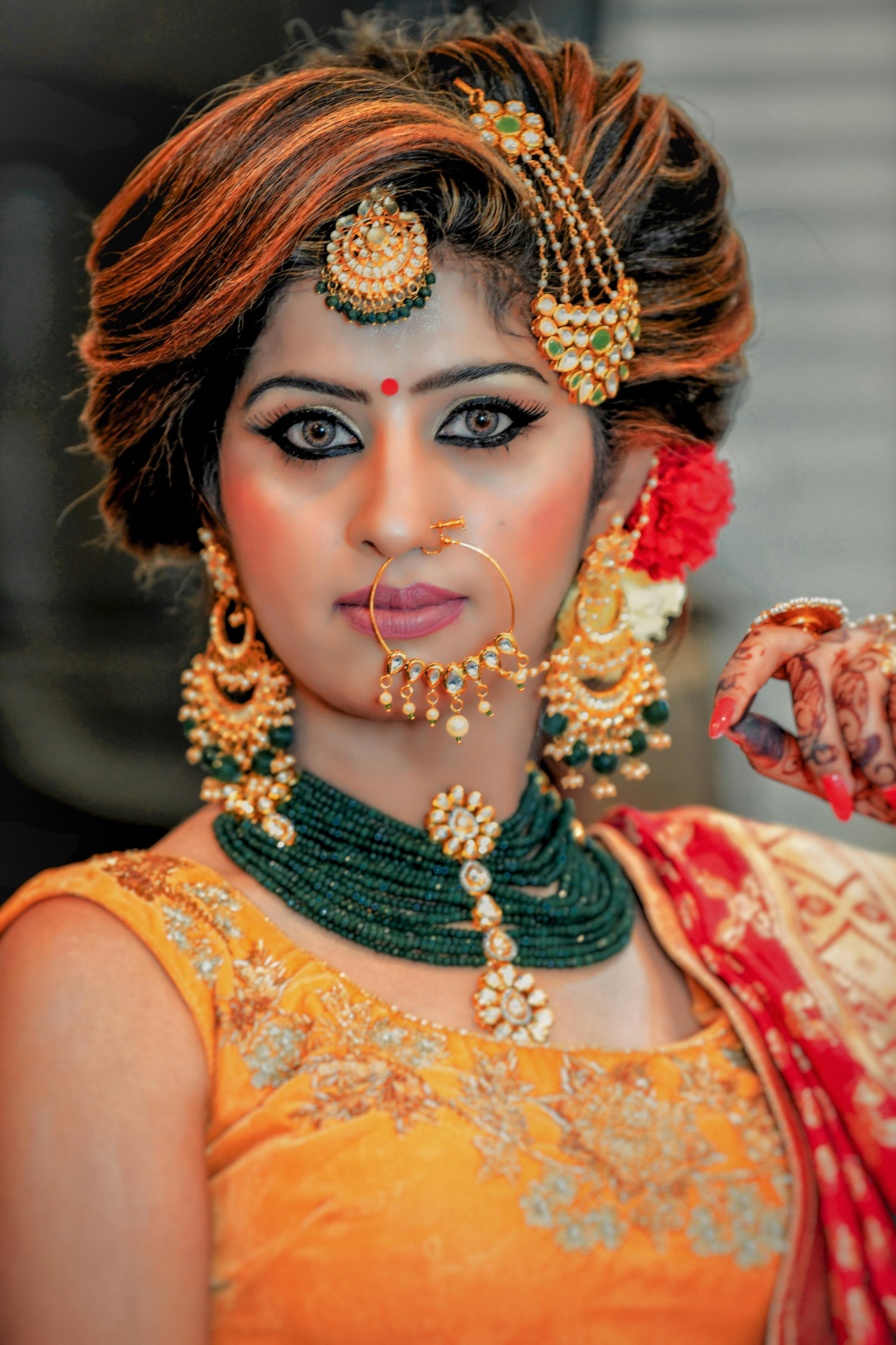 smiling woman wearing jewelries