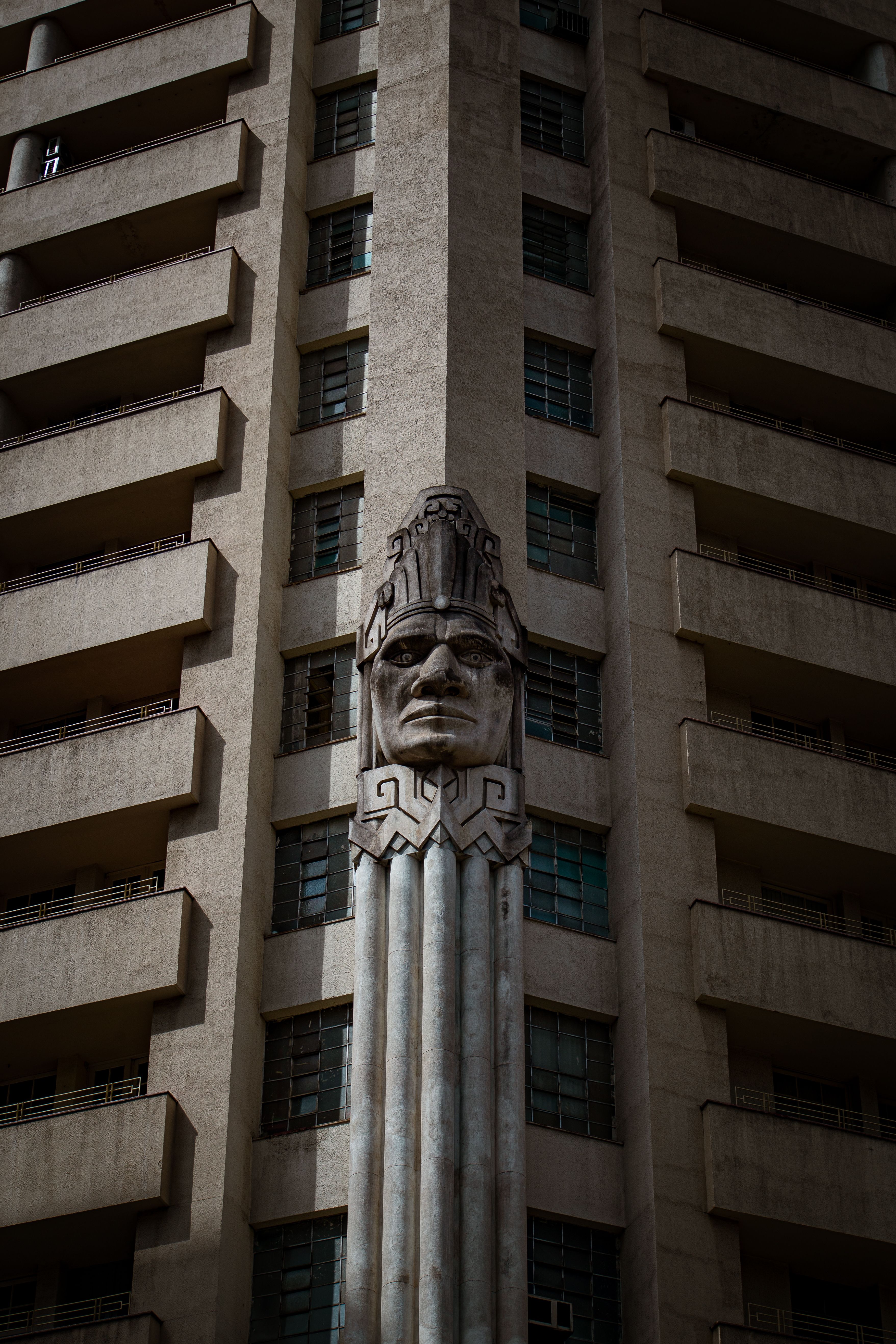 Close-up of Edificio Acaiaca's art deco facade featuring a central statue in Belo Horizonte, Brazil.. pexels, close, edificio