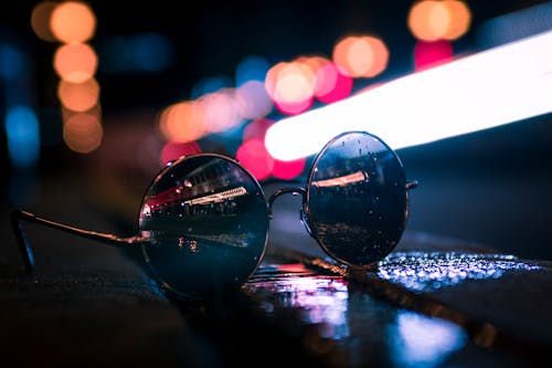 Free Selective Focus Photography of Sunglasses Stock Photo