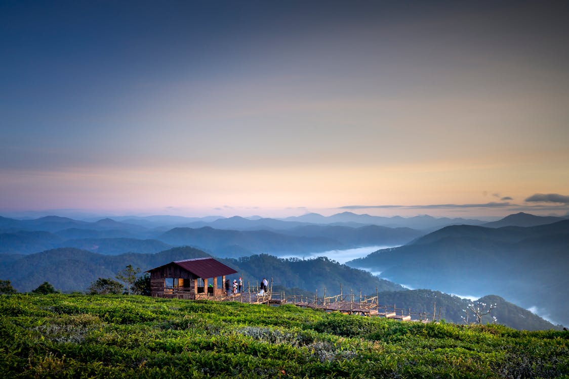 Free Brown Gazebo on Mountain Top Overlooking the Valley Stock Photo