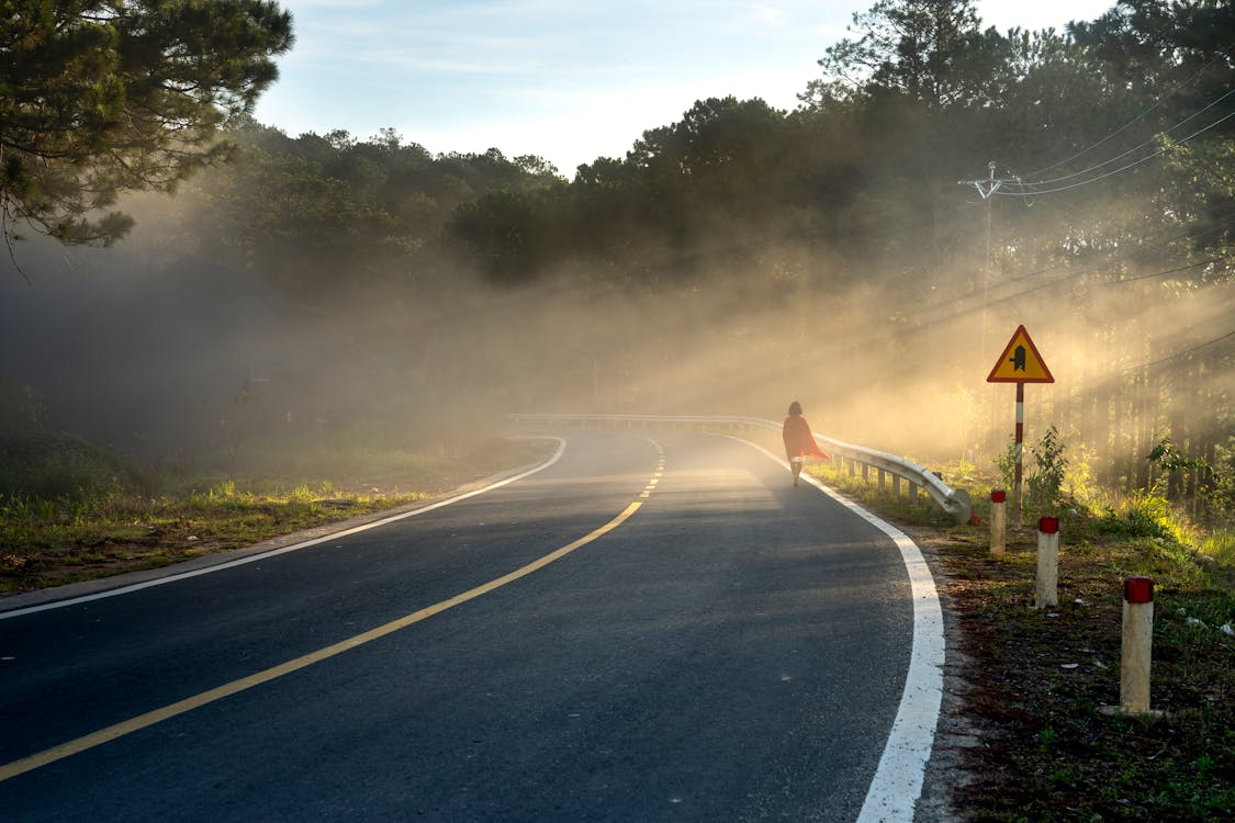 Free Person Walking on Road Stock Photo