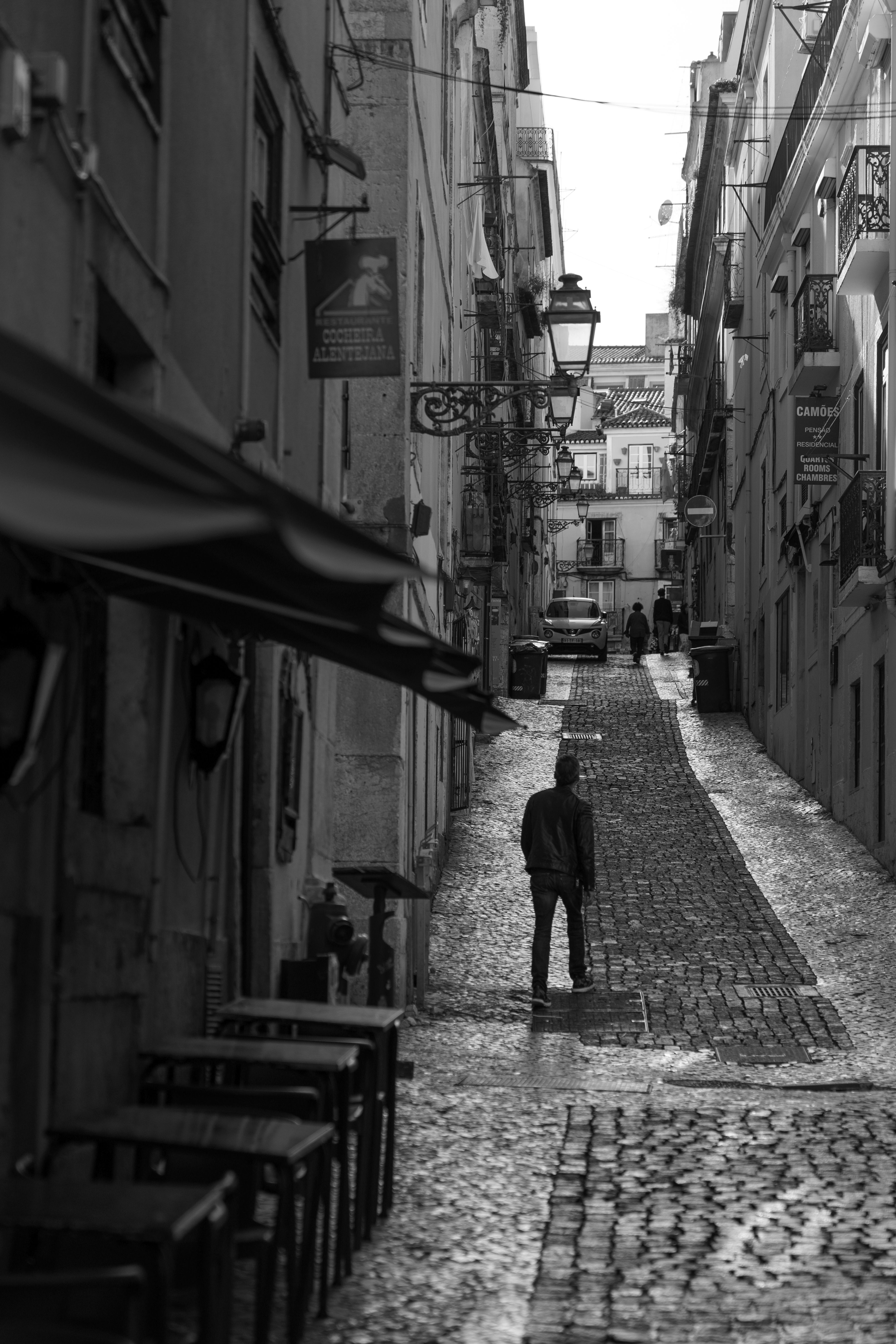 Narrow, Cobblestone Street in Lisbon · Free Stock Photo