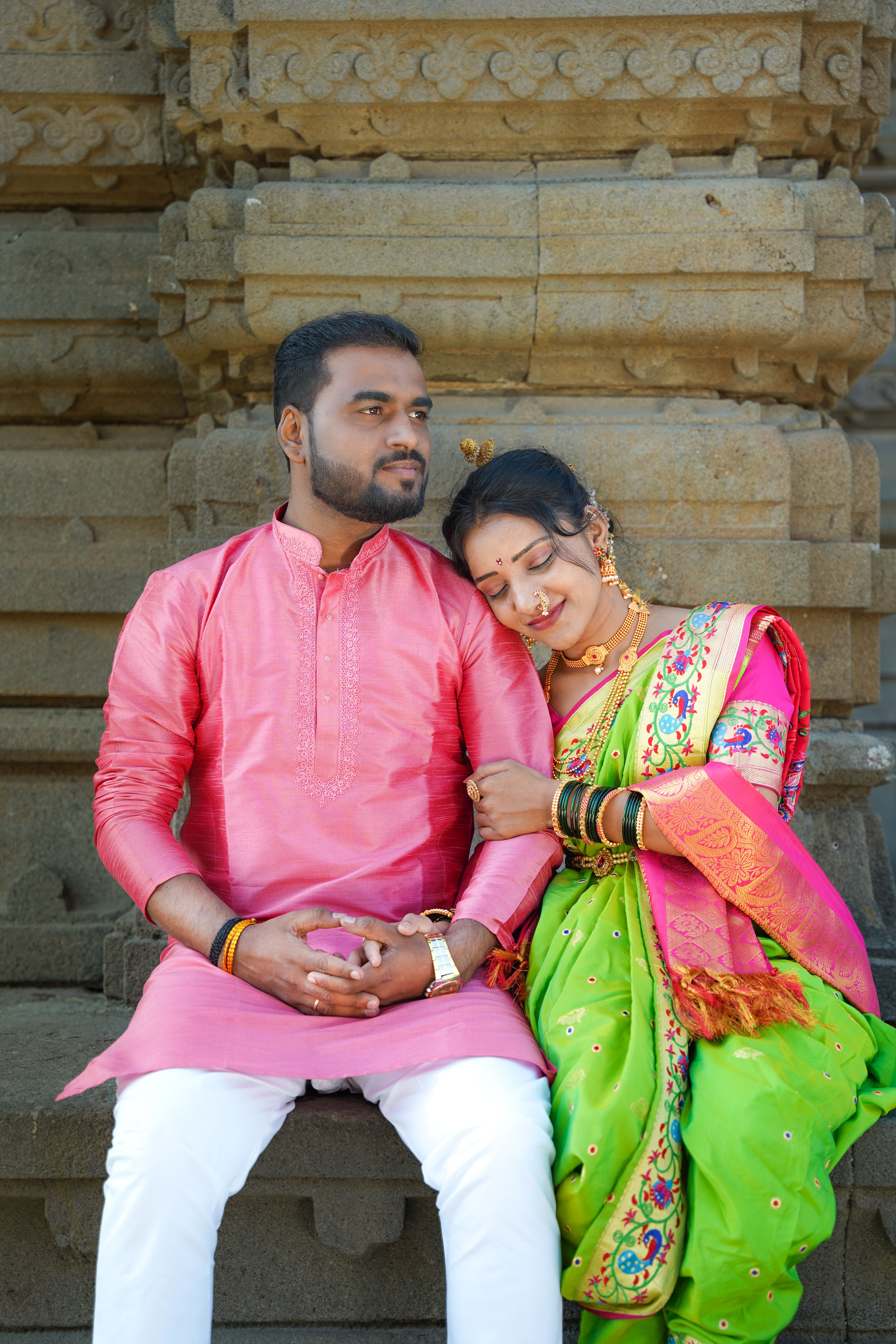 Portrait of Couple Sitting in Traditional Clothing · Free Stock Photo