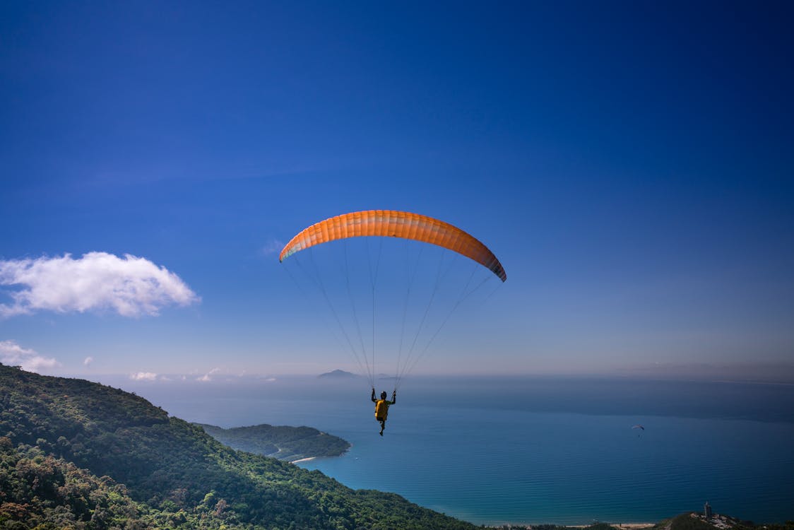 Free Photo of Person Paragliding Stock Photo