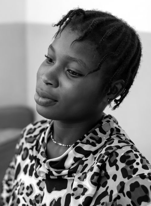 Free Monochrome portrait of a woman with braided hair, exuding elegance and style. Stock Photo