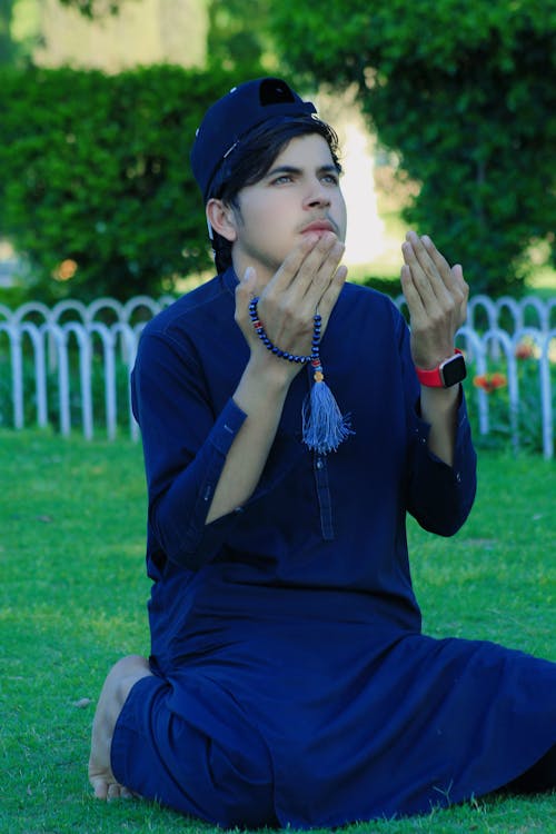 Buddhist Praying on Grass