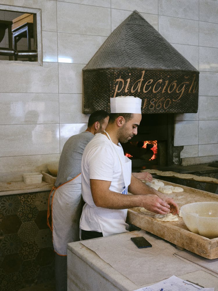 Men Cooking Pide In Pide Restaurant