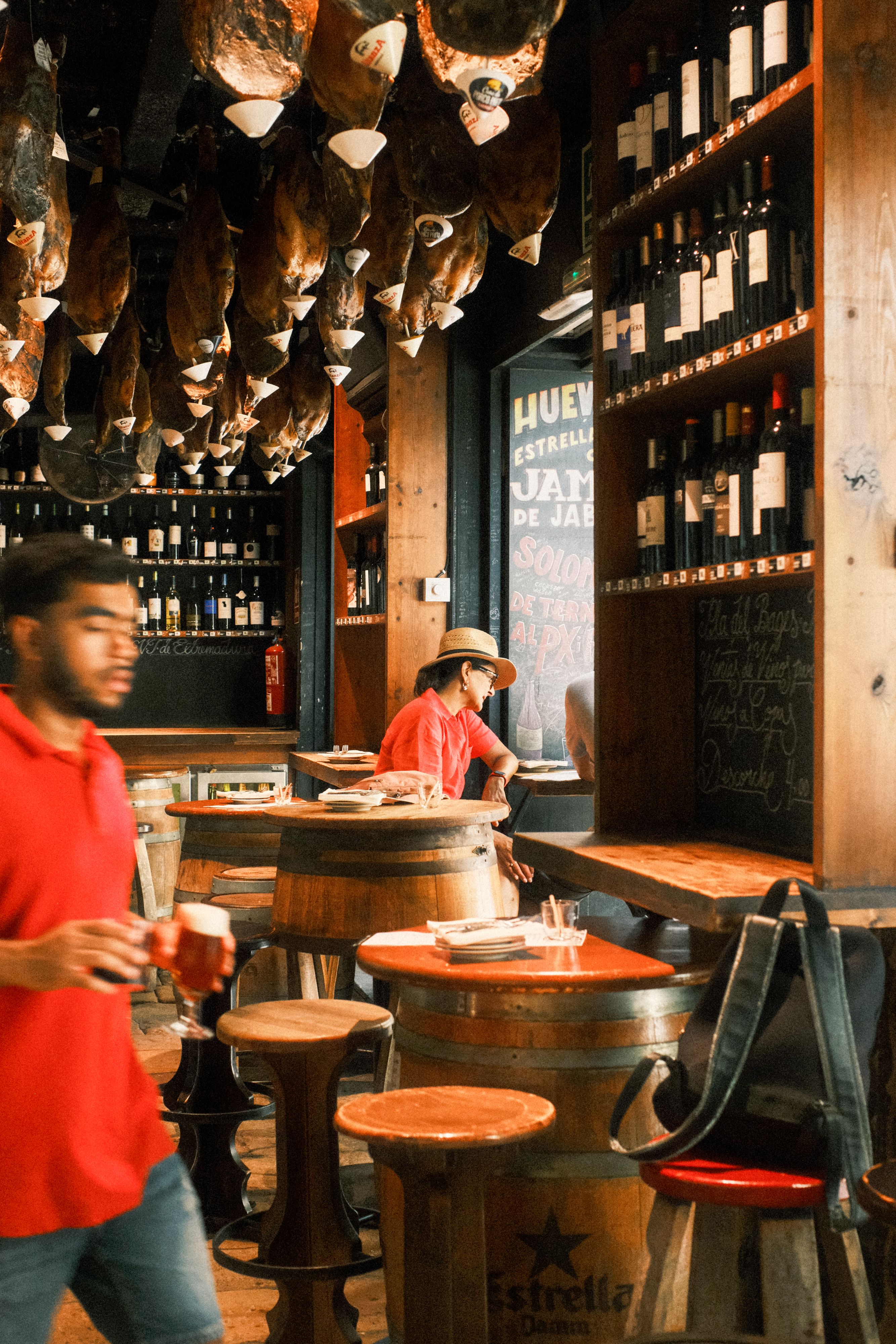 Pintxos and a glass of wine on a Basque bar counter in San Sebastian