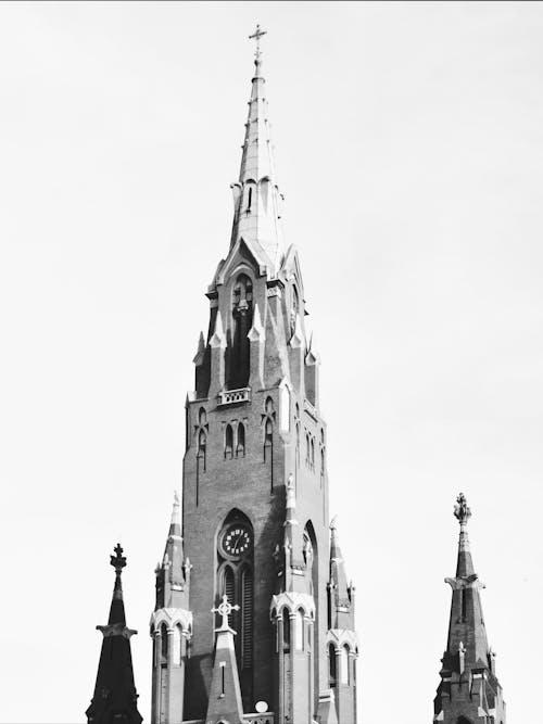 Free A black and white photo of a church steeple Stock Photo