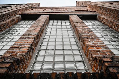A close up of a brick building with windows