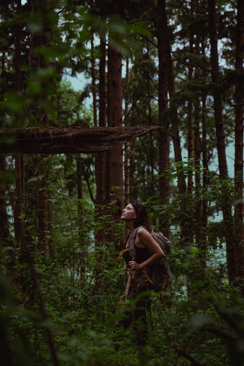 Woman Walking in Forest
