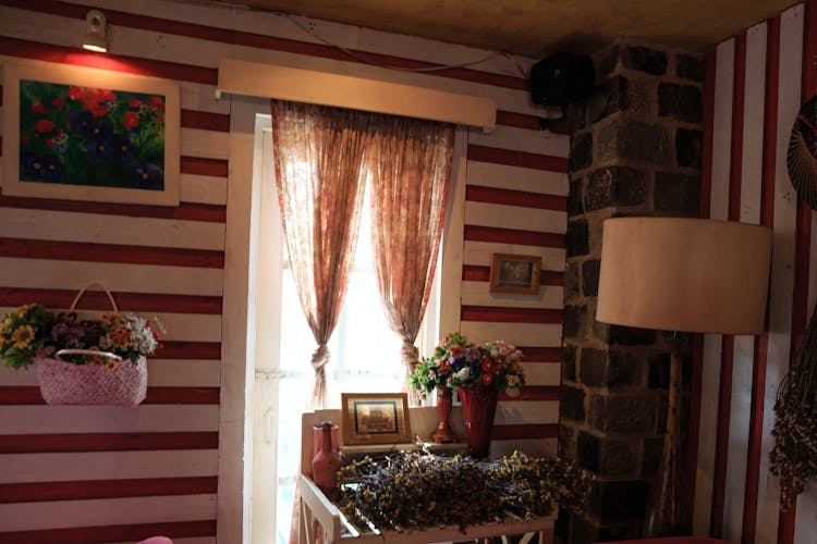 Two Brown Window Curtains Inside White And Red Room