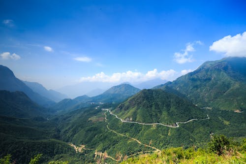 Landscape Photo of Brown and Green Mountains