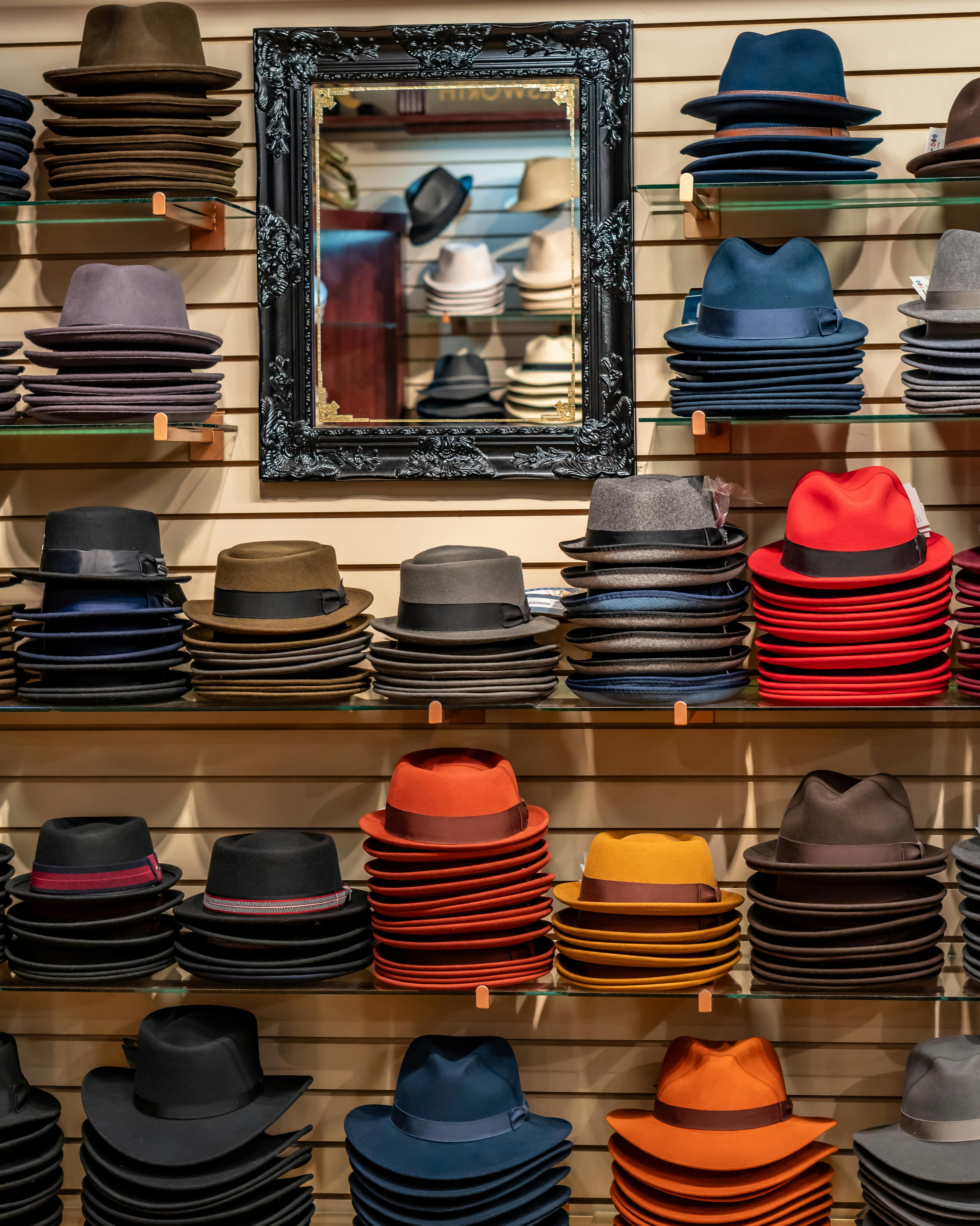 A vibrant display of stacked fedoras in a store in Niagara-on-the-Lake.