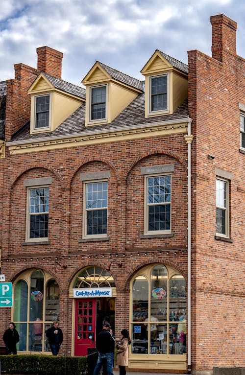 A brick building with a clock on top