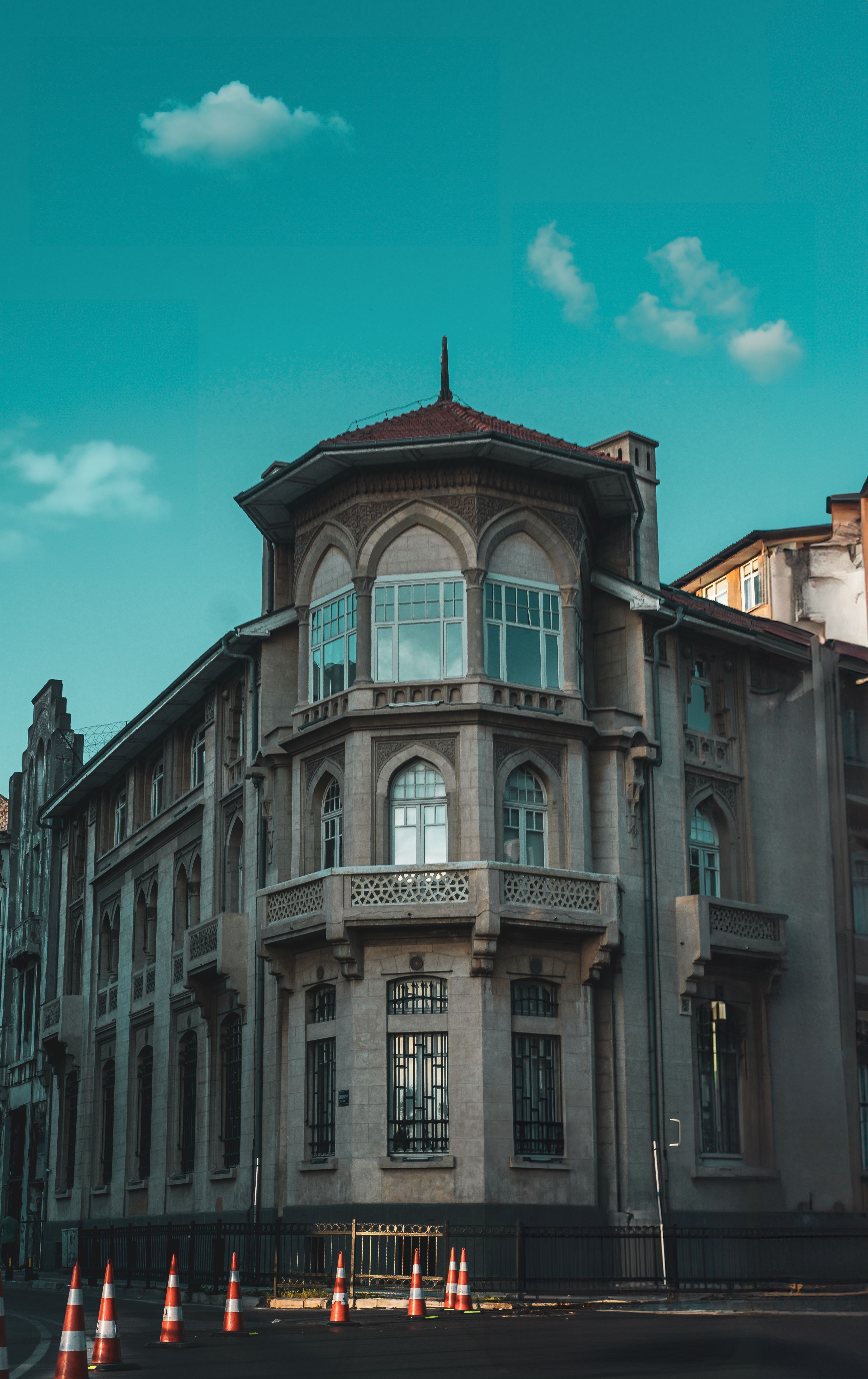 A Tenement House Against Blue Sky · Free Stock Photo