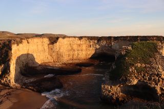 Eroded coastal cliffs at sunset — photo by Ashish Durgude on Pexels